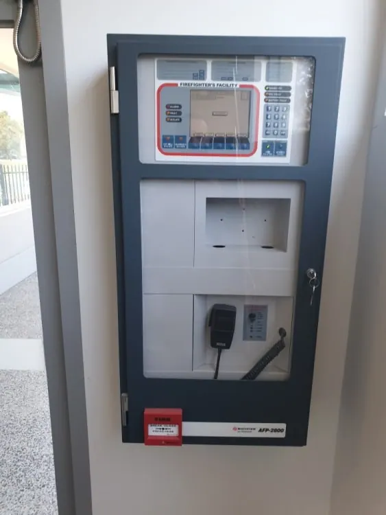 Simplex evacuation and fire phone panel covering seventeen levels of a high rise, with the warden intercom handset, maintained by Safe QLD Fire Protection