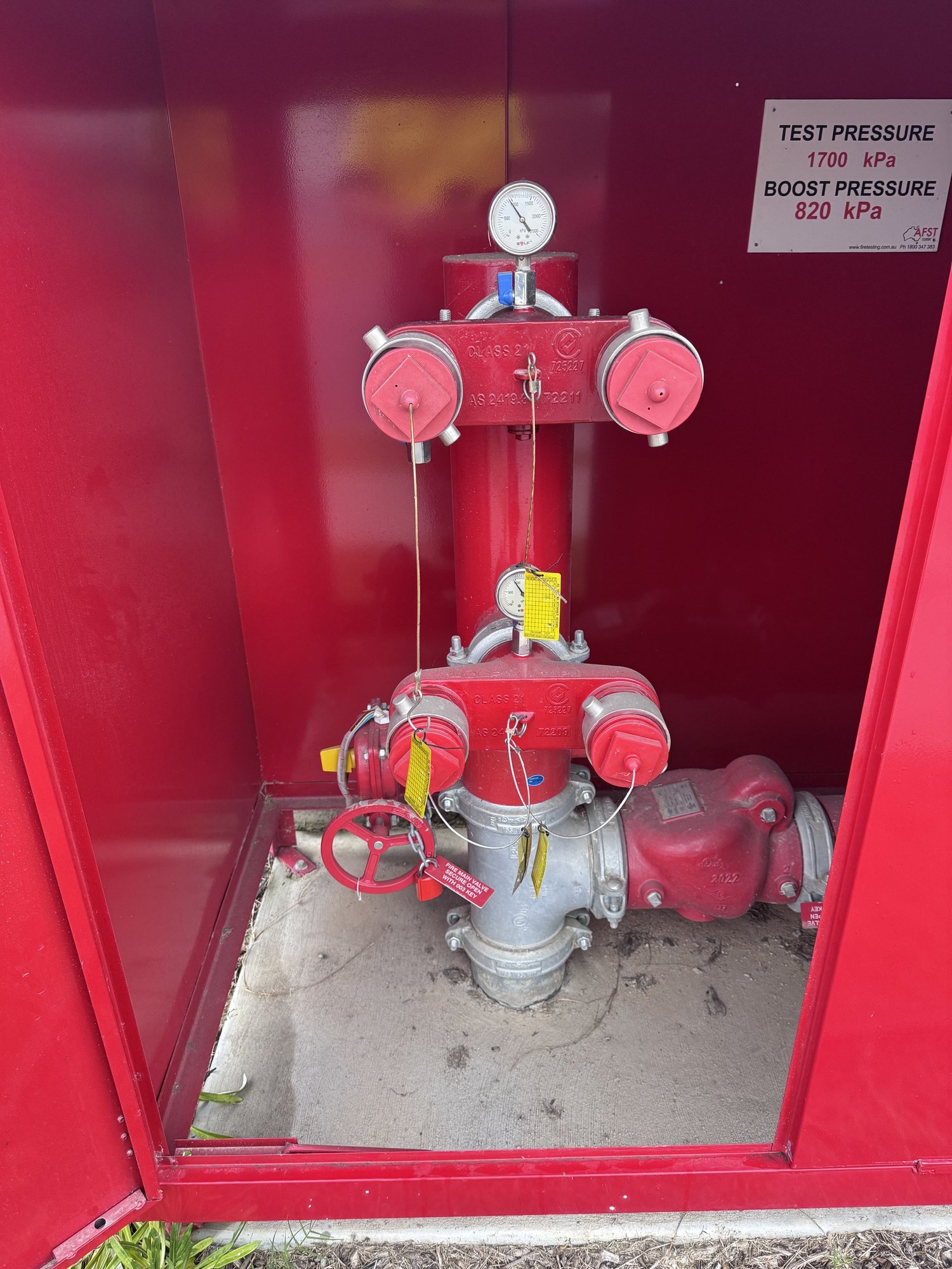 Fire hydrant booster assembly with pressure gauges serviced by Safe QLD